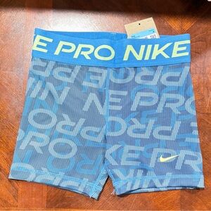 Nike Blue Compression Shorts with Yellow Accents